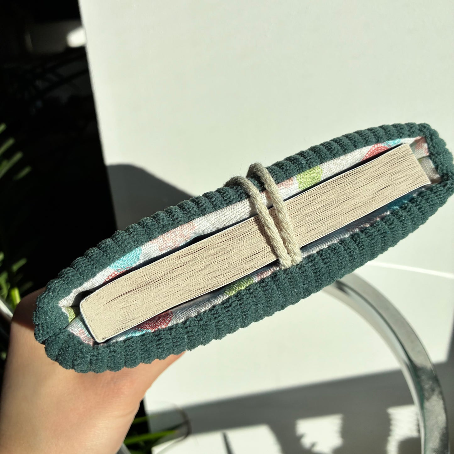 Customizable corduroy book cover in petrol blue